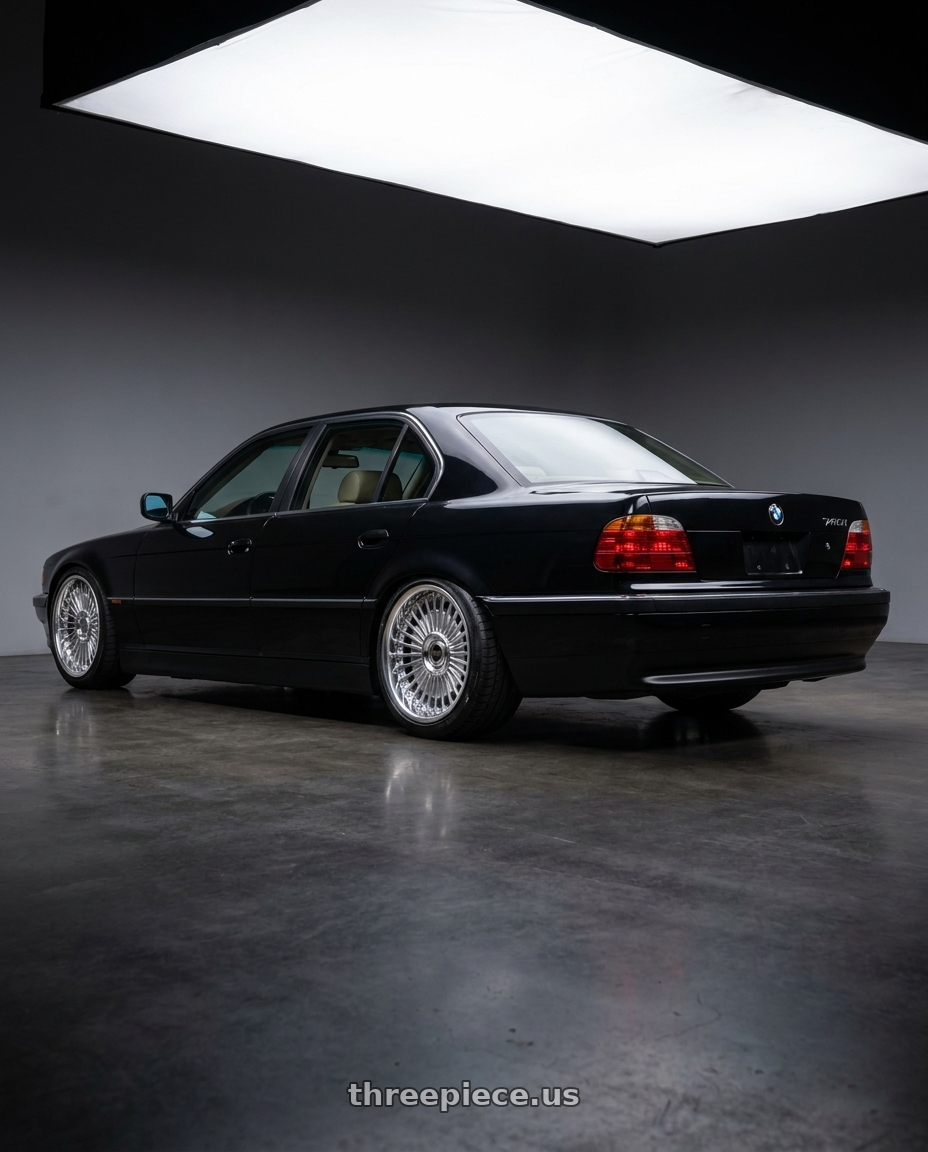 2000 BMW 740I with Work Emitz wheels rear three quarter view slight stretch tires