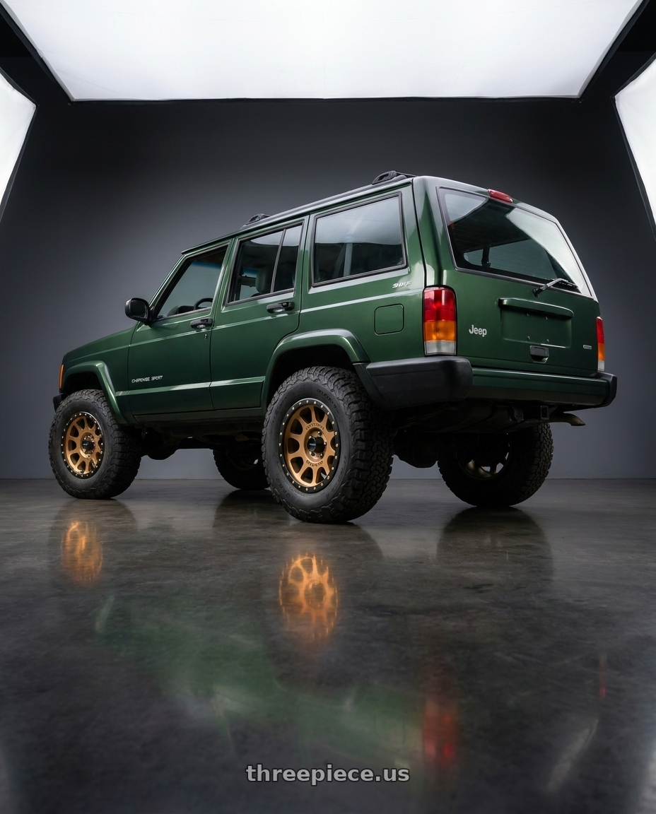 1996 jeep cherokee sport green with Method Race Wheels 305BZ NV 6x139.7 18x9 -12 METHOD BRONZE wheels rear three quarter view meaty tires