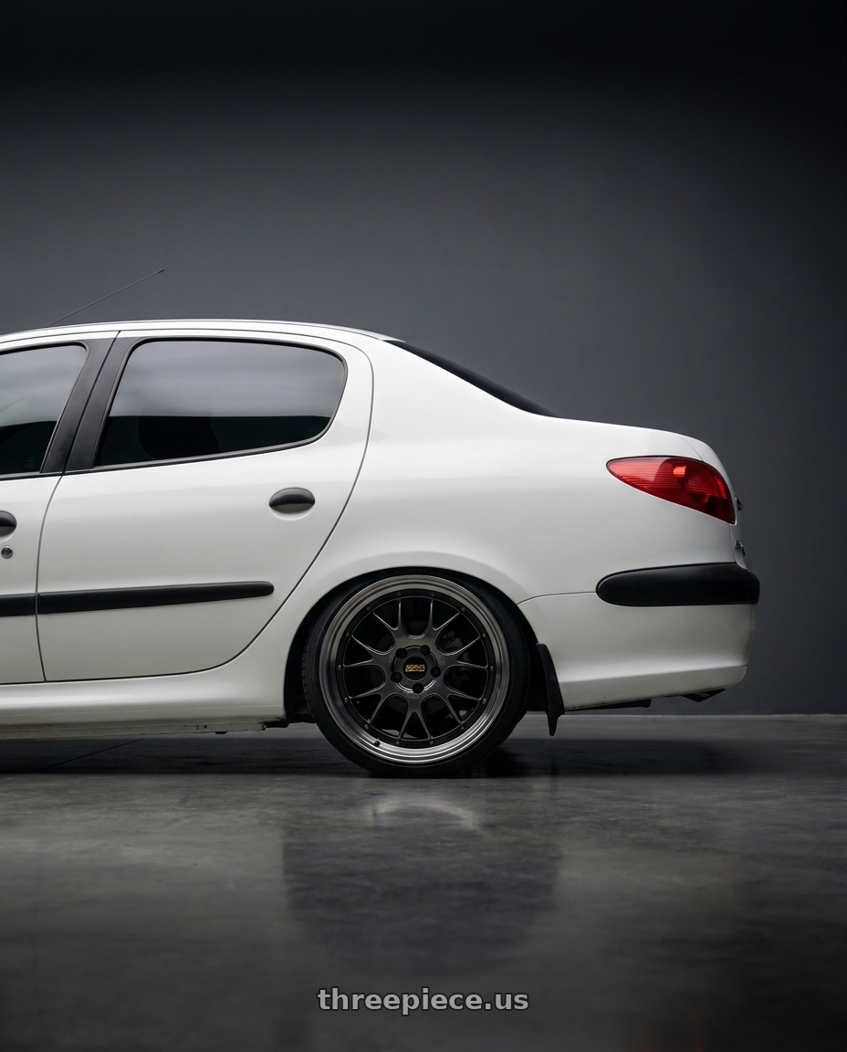 2011 Peugeot 206 SD with BBS LM-R 5x114.3 19x8.5+43 Diamond Black wheels rear three quarter view square tires