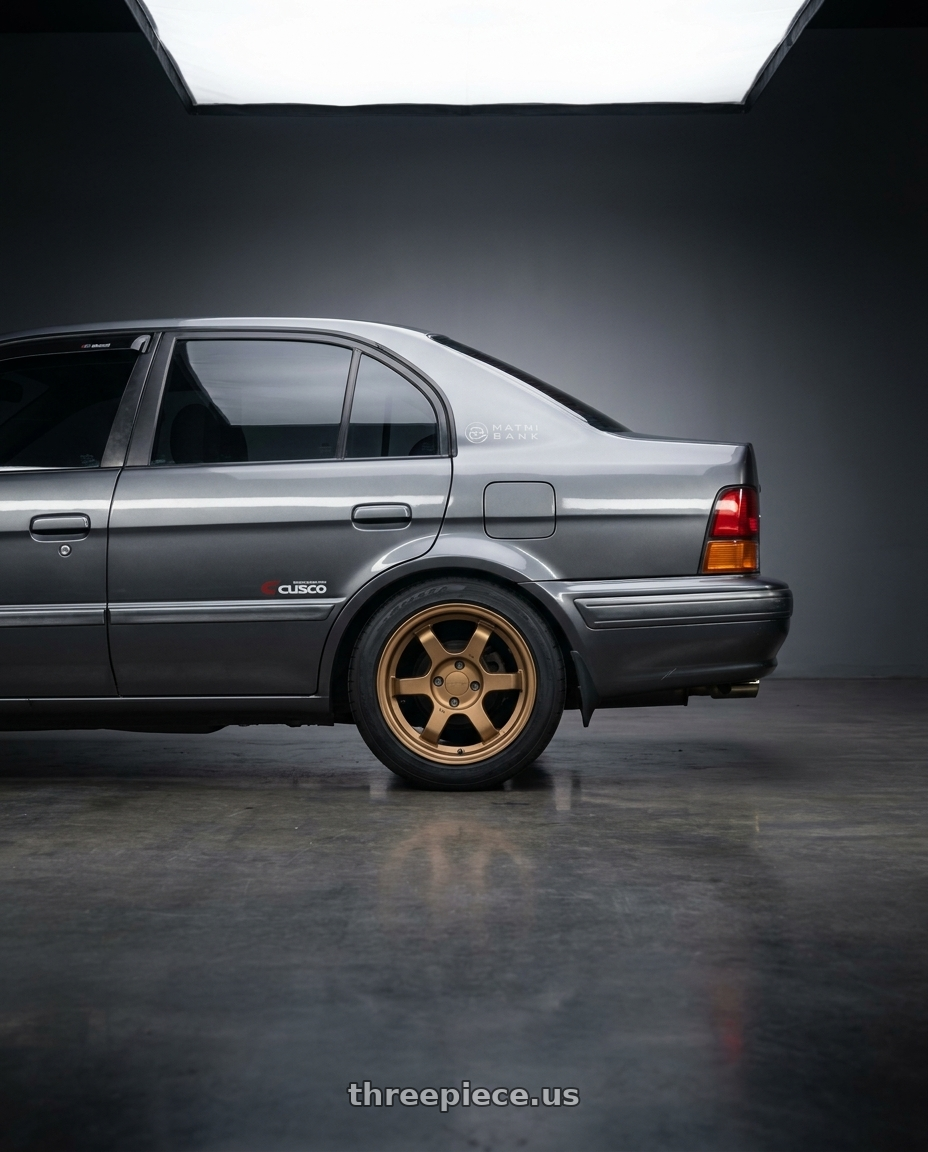 1996 Toyota Tercel EL51 with 9six9 SIX-1 Deep 4x100 15X8 +20 Matte Bronze wheels rear three quarter view square tires