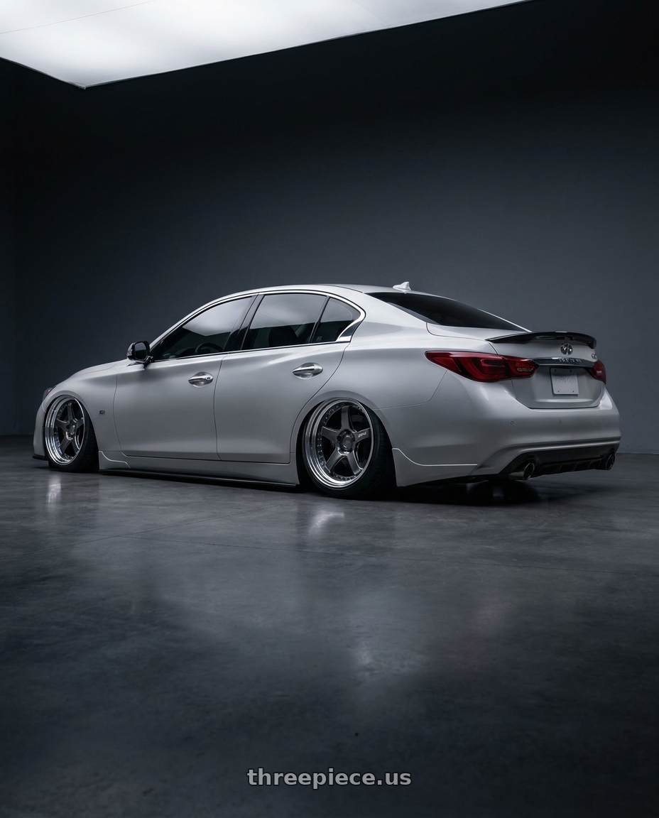 2019 INFINITI Q50 with SSR Professor SPX STD 5x108 19X10.5+18 NR Disk Prism Dark Gunmetallic wheels rear three quarter view slight stretch tires