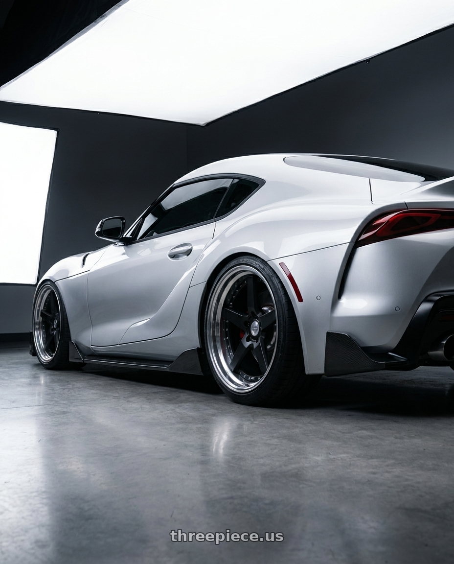 2020 gr supra premium with Work Gnosis Gr203 5x112 20x10.5+38 W Disk Matte Black wheels rear three quarter view square tires