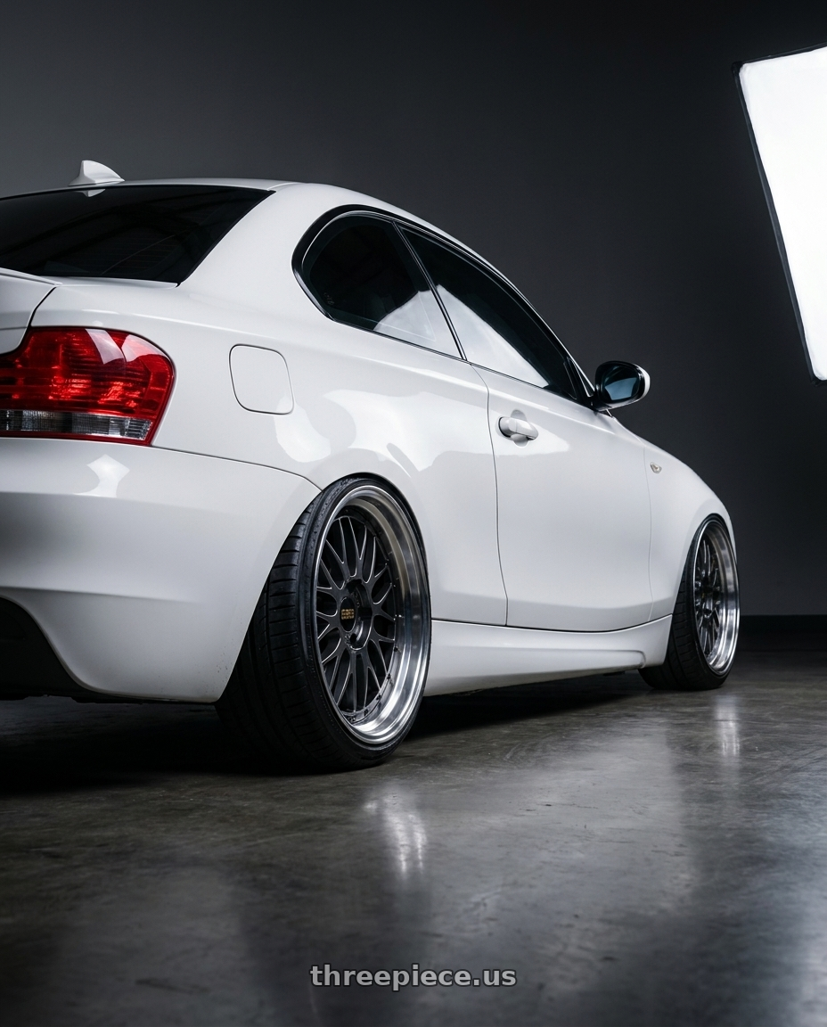 2008 e82 135i with BBS LM 5x114.3 18x9.5+38 Diamond Black wheels rear three quarter view extreme stretch tires