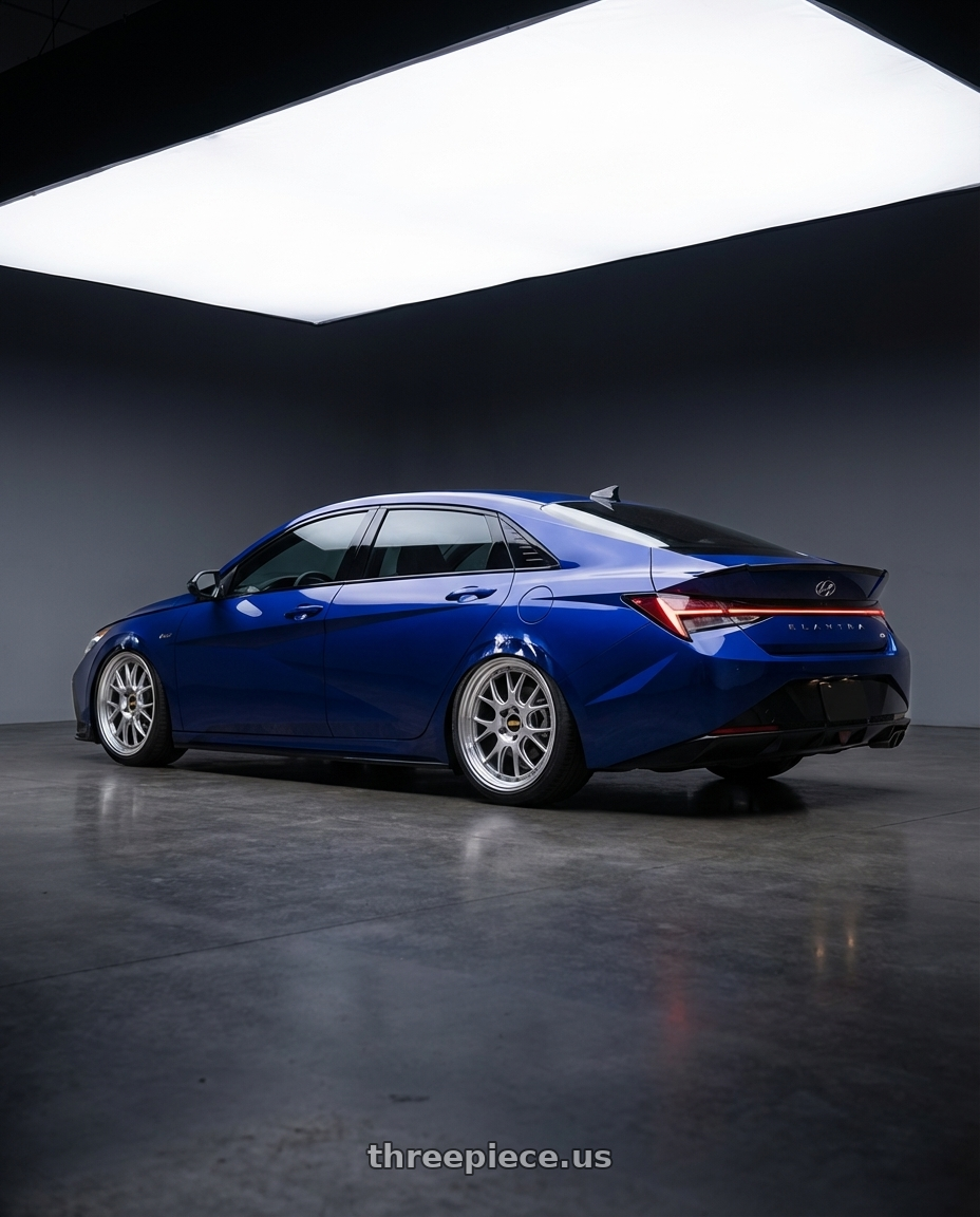 2025 Hyundai Elantra N Line  with BBS LM-R 5x114.3 19x8.5+43 Diamond Silver wheels rear three quarter view square tires