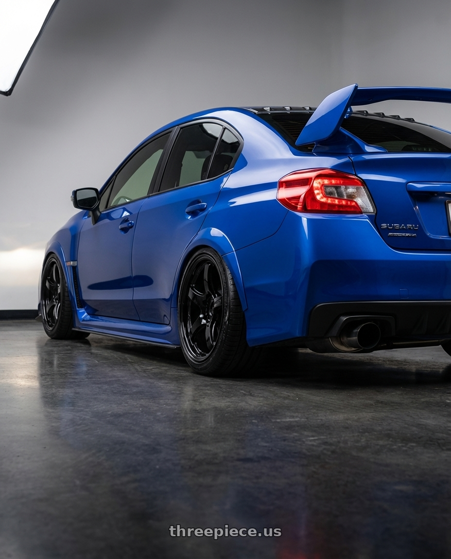 2018 Subaru WRX STI with Gram Lights 57CR 5x114.3 18x9.5+12 Glossy Black wheels rear three quarter view slight stretch tires