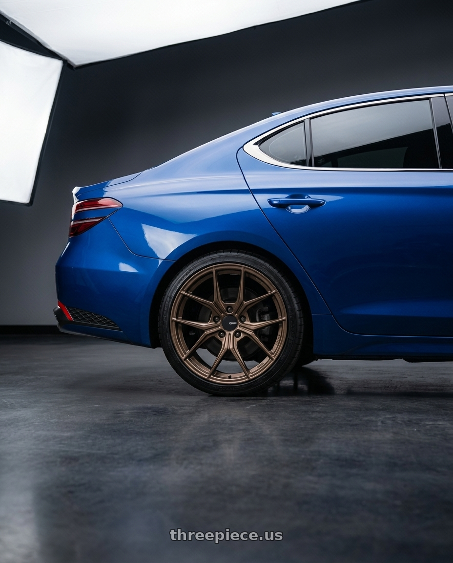 2022 Genesis G70 with Enkei TSR-X 5x114.3 20x8.5+40 Gloss Bronze wheels rear three quarter view square tires
