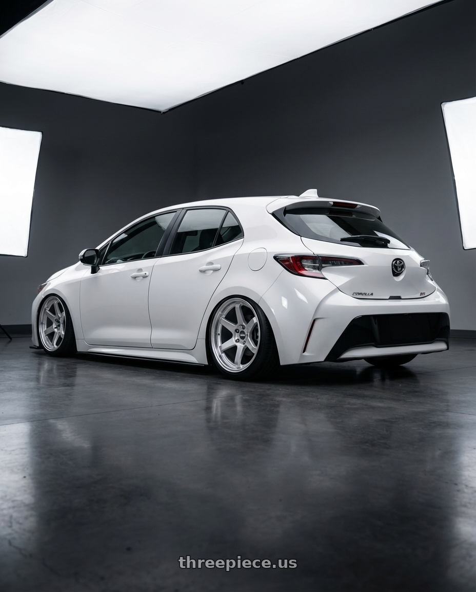 2023 Toyota Corolla Hatchback with ESR Wheels APEX SERIES AP6 5x114.3 18x9.5 +22 Hyper Silver wheels rear three quarter view slight stretch tires