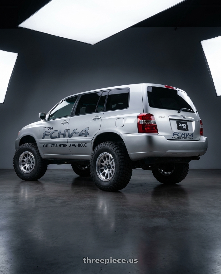 2001 Toyota FCHV 3 with Dirty Life Roadkill Race 9302 17x9-38 Machined Beadlock wheels rear three quarter view meaty tires