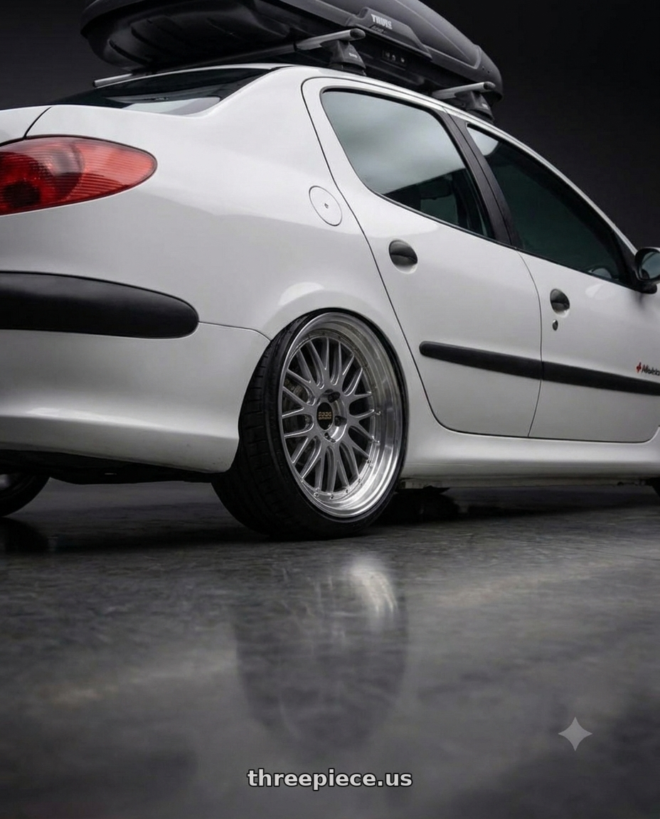 2011 Peugeot 206 SD with BBS FS 5x112 19x8.0+30 Diamond Silver wheels rear three quarter view square tires