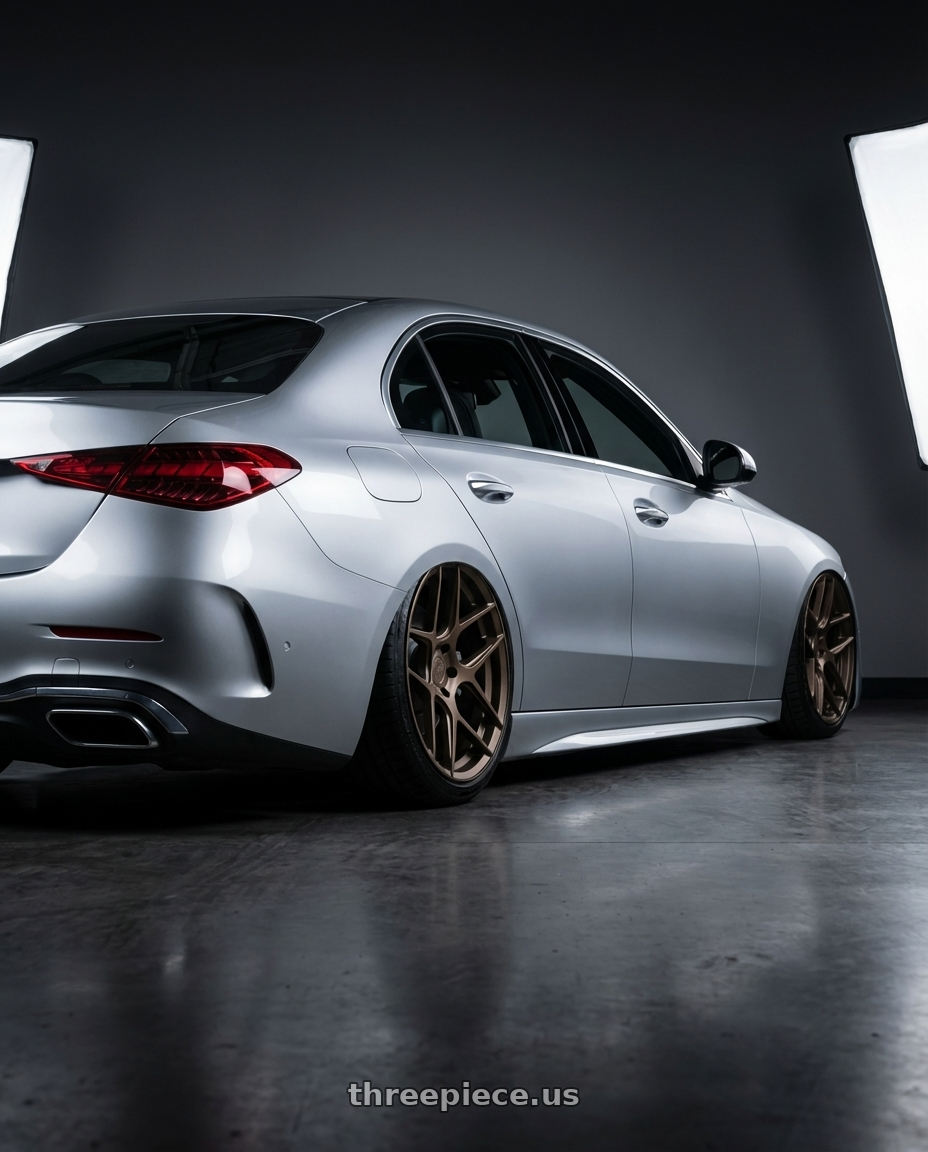 2022 Mercedes-Benz C-Class W206 with Aodhan AFF2 5x112 19x8.5+35 Matte Bronze wheels rear three quarter view slight stretch tires