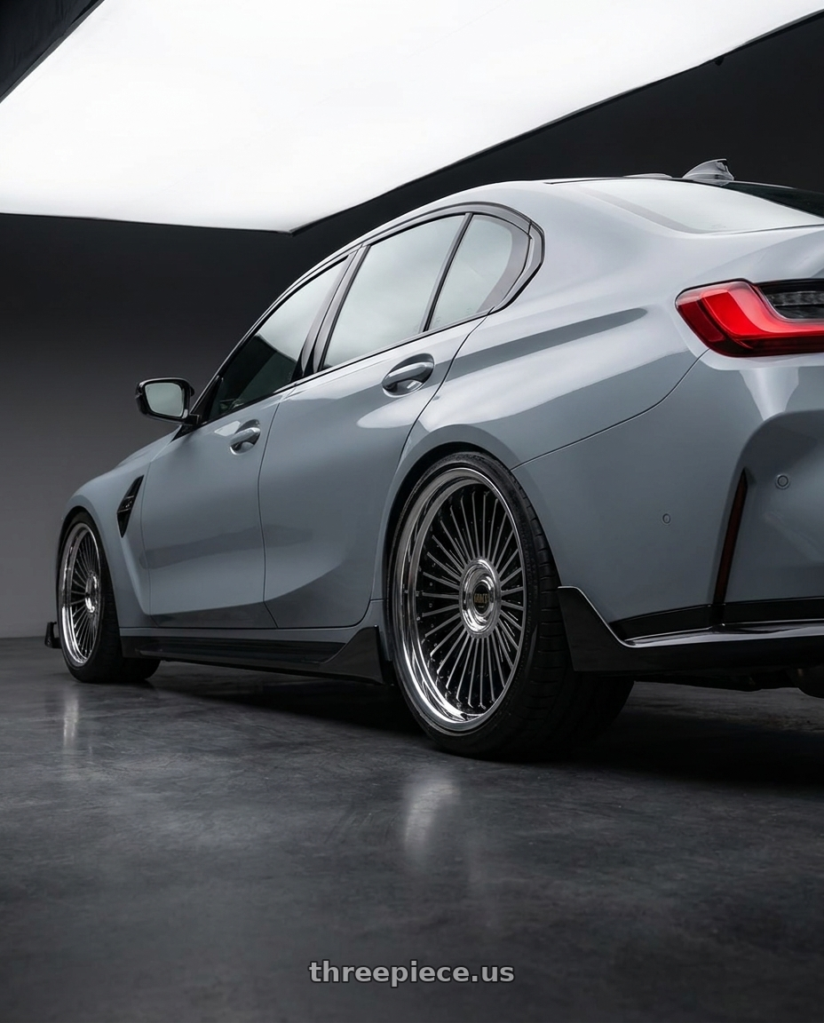 2022 BMW M3 with Work Emitz Black Polish 5x112 19x7.5 +22 wheels rear three quarter view square tires