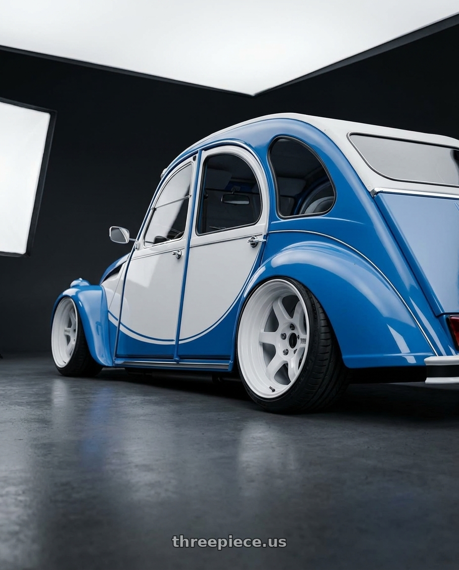 1990 Citroen 2cv with Volk Racing TE37V 10th Anniv 4x100 17x7.5+30 Dash White wheels rear three quarter view extreme stretch tires