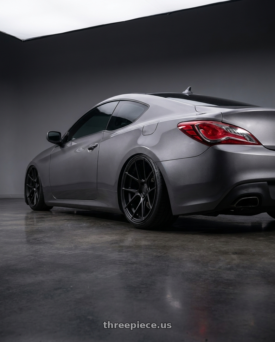 2014 Hyundai Genesis Coupe with Avant Garde Wheels M510 5X114.3 19x9.5 +40 Matte Black wheels rear three quarter view slight stretch tires