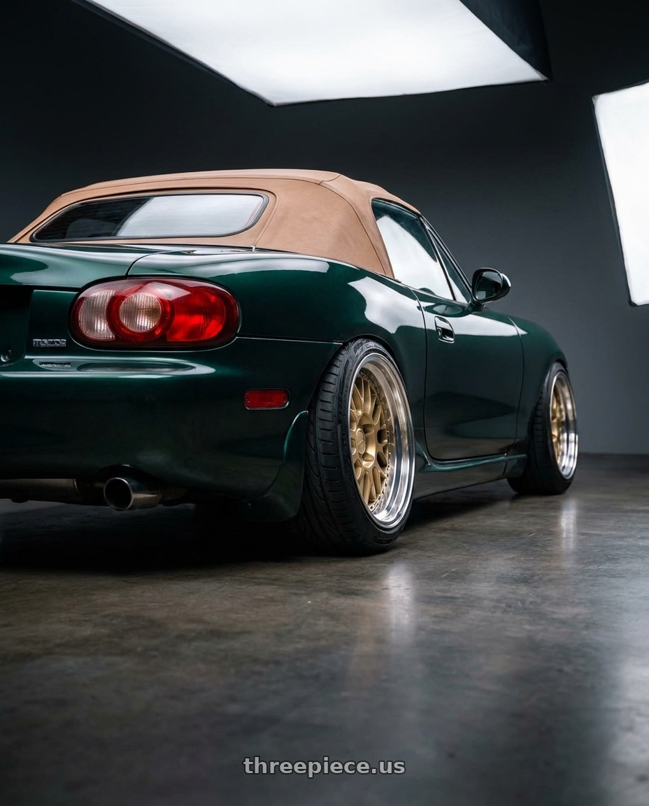 2000 Mazda Miata with Work Brombacher Mesh wheels rear three quarter view extreme stretch tires