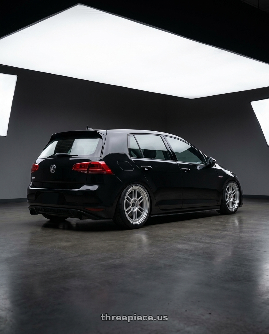 2017 Volkswagen GTI S with Enkei RPF1 5x112 18x8+35 Silver wheels rear three quarter view square tires