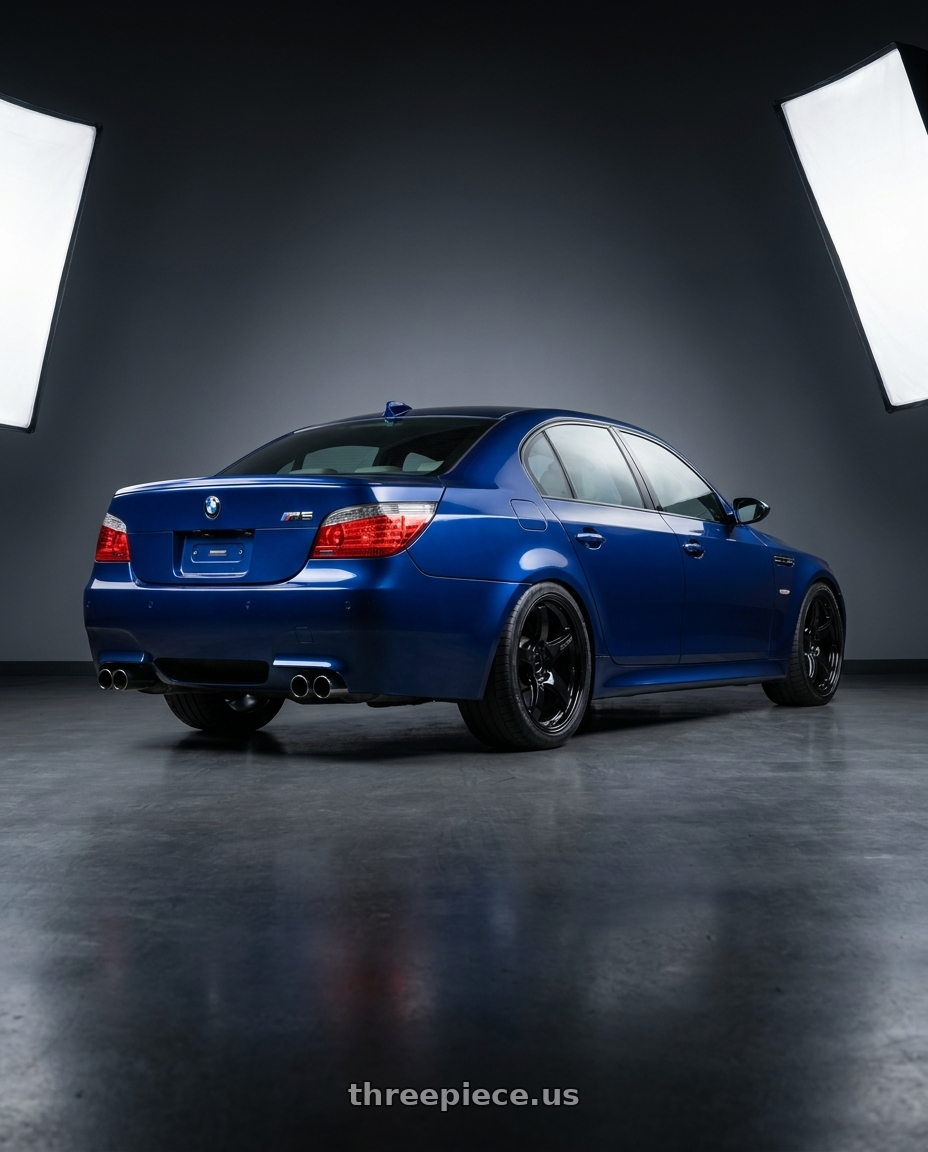 2010 BMW M5 E60 with Gram Lights 57CR 5x120 19x10.5+35 Glossy Black wheels rear three quarter view square tires