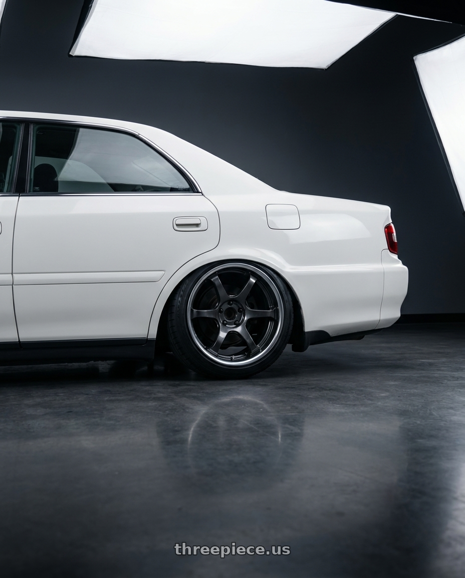 1998 Toyota Chaser with Ssr Reiner Type 6R 5x114.3 18X9.5 22 Hyper Disk Prism Dark Gunmetal wheels rear three quarter view square tires