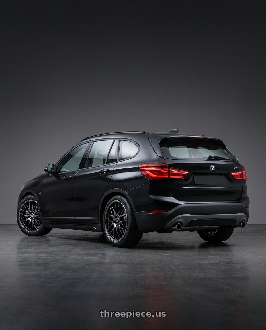 2017 BMW X1 with BBS RG-R 5x100 17x7.5 +35 Diamond Black wheels rear three quarter view square tires