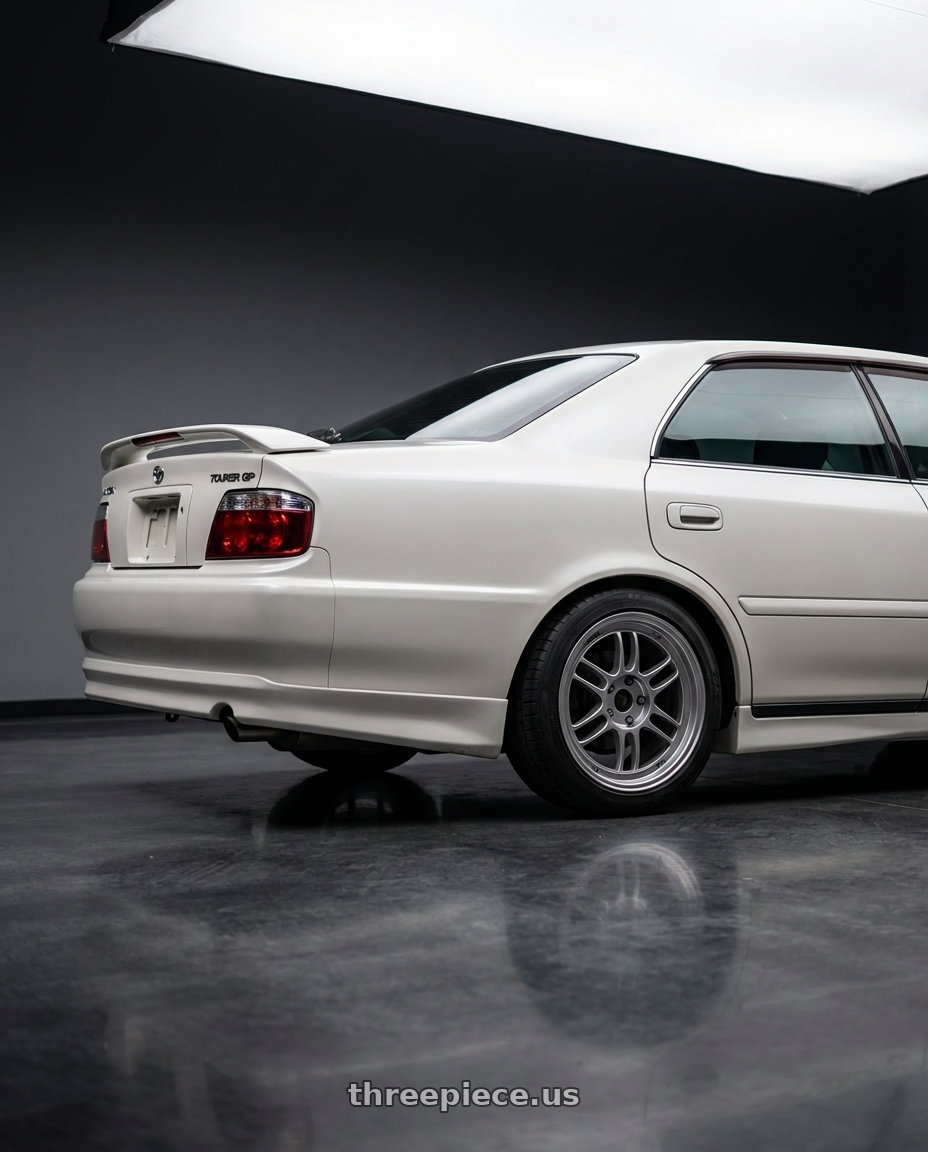 1999 Toyota Chaser Tourer GP with Enkei RPF1 5x112 18x7.5+48 Silver wheels rear three quarter view square tires