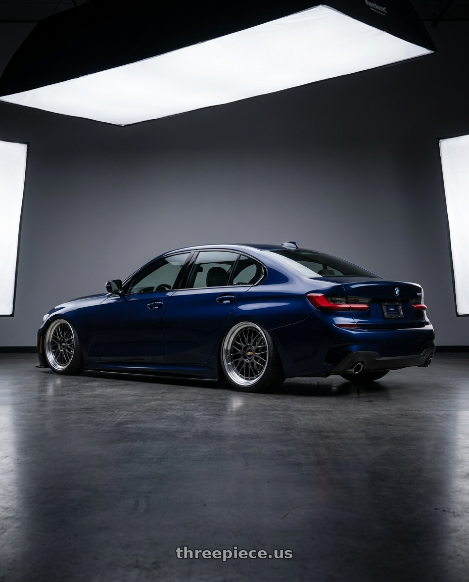 2019 Bmw 330i with BBS LM 5x114.3 18x8.0+35 Diamond Black wheels rear three quarter view slight stretch tires