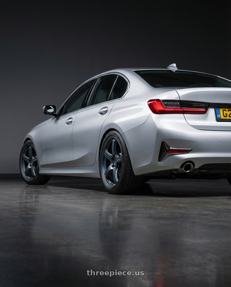 2023 BMW 3 Series G20 with Gram Lights 57CR 5x112 19x8.5+45 Gunblue II wheels rear three quarter view square tires