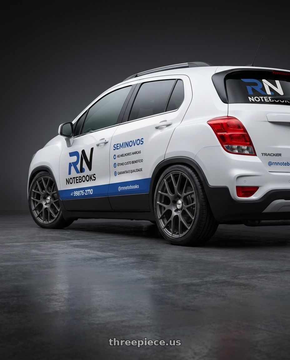 tracker 2017 adesivada with TSW NURBURGRING 5X114.3 17X7.5 +45 MATTE GUNMETAL wheels rear three quarter view square tires