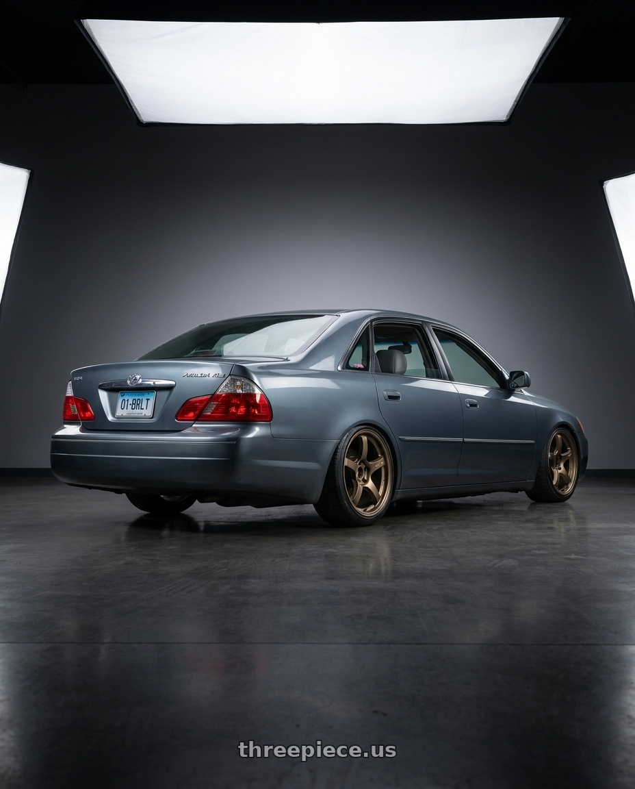 2003 toyota avaloin xls grey blue with Gram Lights 57CR 5x114.3 18x9.5 +22 BRONZE 2 wheels rear three quarter view slight stretch tires