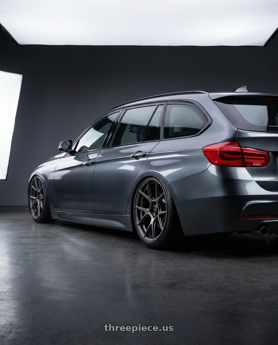2016 BMW 3 Series F30 with Konig Ampliform 5x120 19x10+28 Dark Metallic Graphite wheels rear three quarter view slight stretch tires