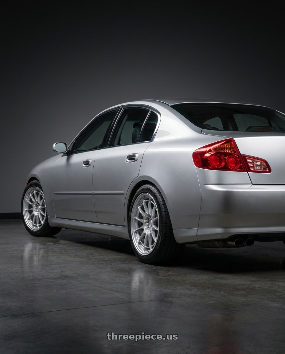 2004 Infiniti g35 sedan with Enkei NT03+M 5x114.3 18x8.5+38 Silver wheels rear three quarter view square tires