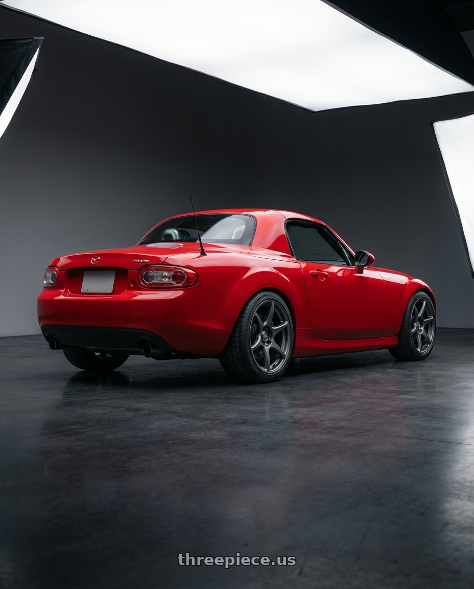 2012 Mazda MX-5 Miata NC with Kansei K11G Tandem 5x114.3 17x9 35 Gunmetal wheels rear three quarter view square tires