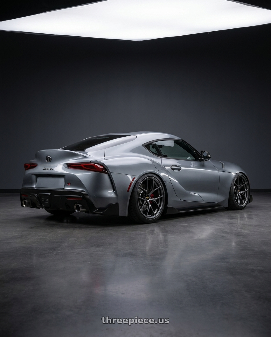 2021 Toyota GR Supra 3 with BBS FI-R 5x112 19x9.5 +15 Diamond Black wheels rear three quarter view square tires