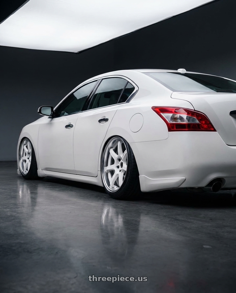 2009 Nissan Maxima Pearl White with Work T7r 2P 5x114.3 18x10.0 +0 WHITE wheels rear three quarter view extreme stretch tires