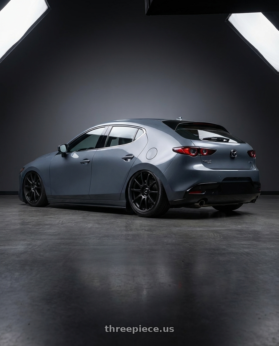 2023 Mazda Mazda3 Turbo with Ssr Gtv02 5x114.3 18x9+45  FLAT BLACK wheels rear three quarter view slight stretch tires