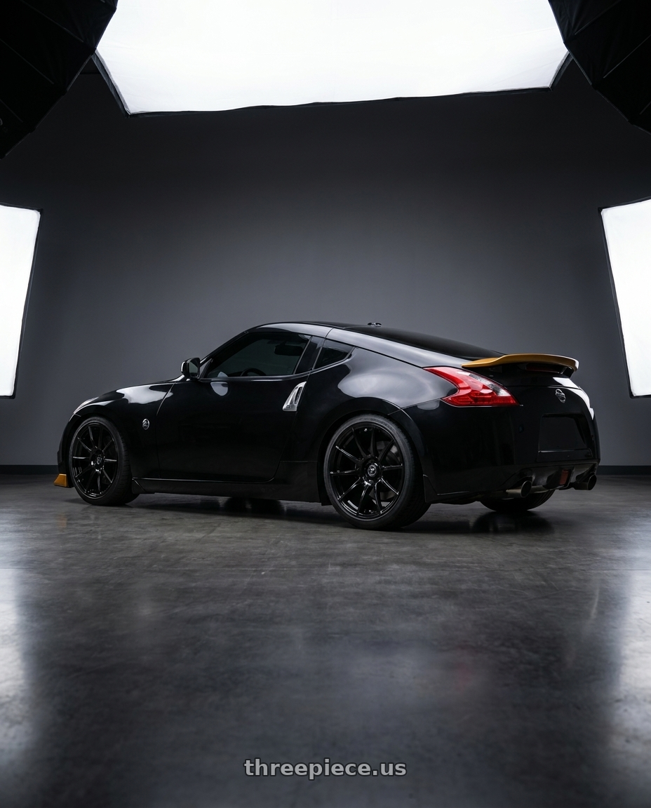 2009 nissan 370z with Forgestar CF10 5x120.65 19x12 +50 Gloss Black wheels rear three quarter view square tires
