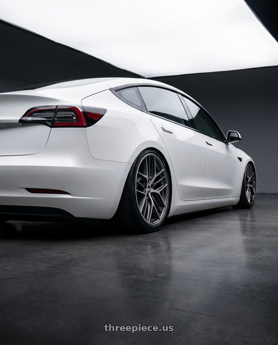 2023 Tesla Model 3 with BBS CC-R 5x114.3 19x8.5+30 Graphite w/ Diamond Cut Face wheels rear three quarter view slight stretch tires