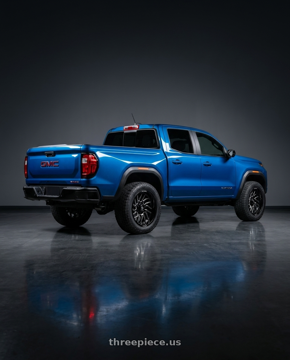 2023 Gmc Canyon blue with Fuel 1PC D807 HURRICANE 6X139.7 20X10 -18 GLOSS BLACK MILLED wheels rear three quarter view square tires