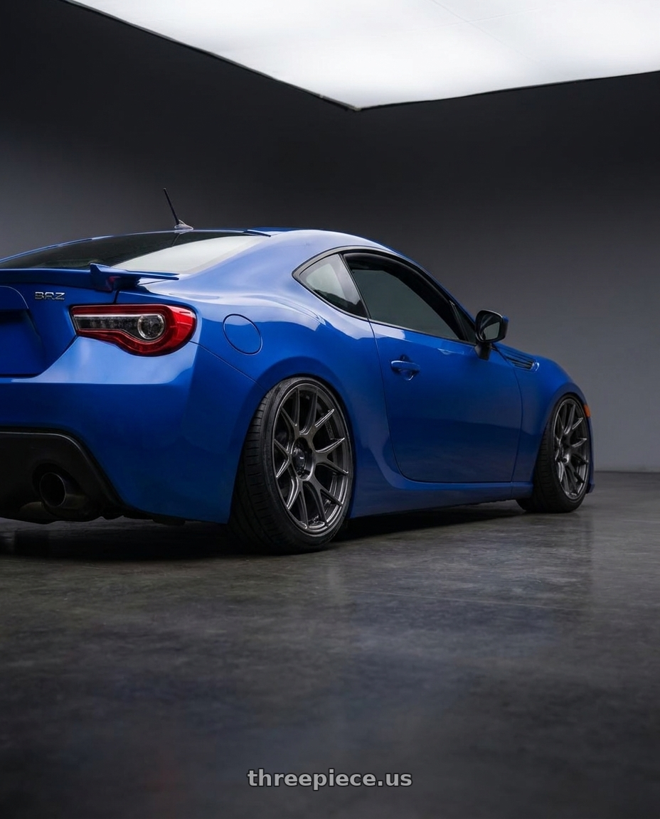2024 Subaru BRZ with Konig Ampliform 5x114.3 18x8.5+35 Dark Metallic Graphite wheels rear three quarter view slight stretch tires