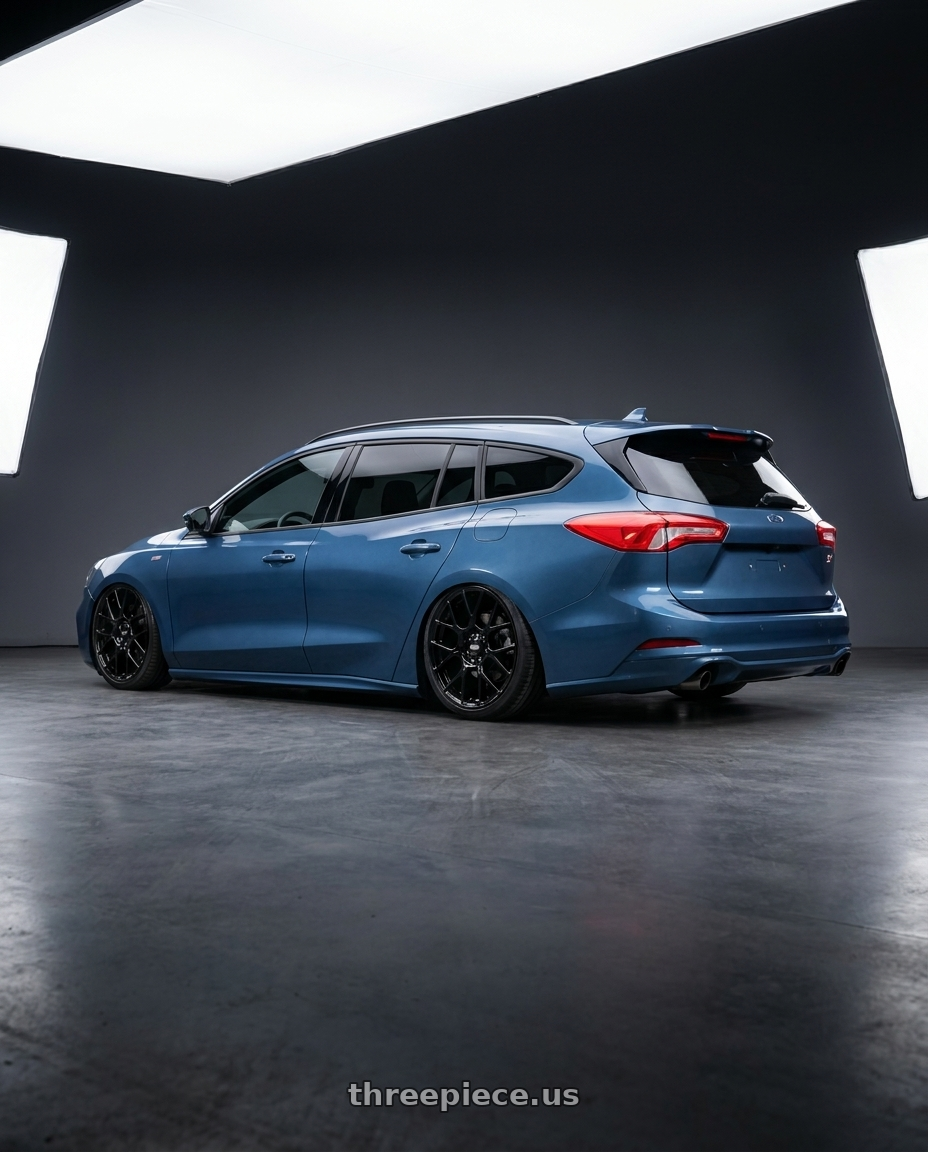 2020 Focus st wagon with BBS XR 5x108 19x8.5+43 Gloss Black wheels rear three quarter view slight stretch tires