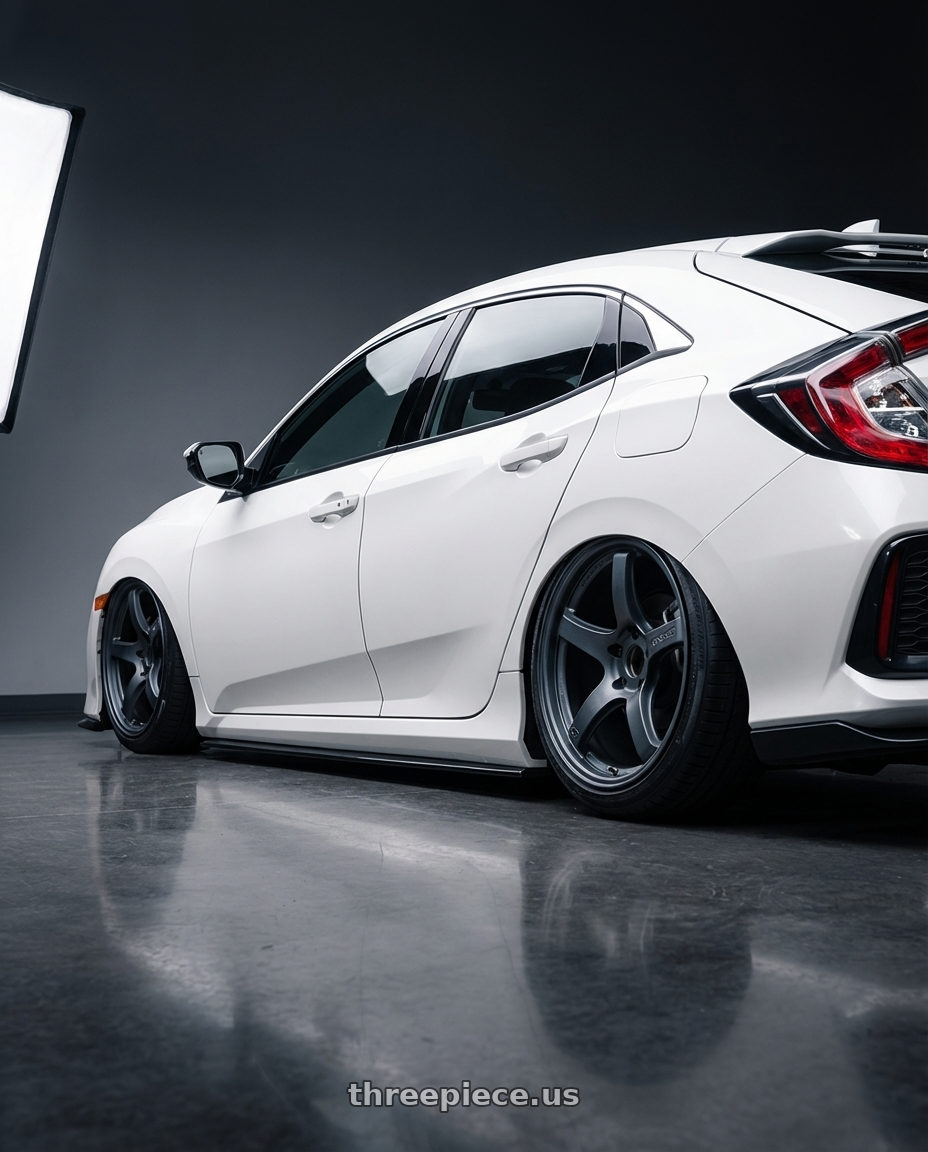 2024 Honda Civic with Gram Lights 57CR 5x114.3 19x9.5+25 Gunblue II wheels rear three quarter view slight stretch tires