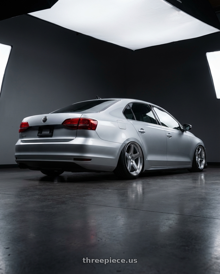 2016 Volkswagen Jetta GLI MK6 with Aodhan AH09 5x112 18x9.5 +35 Gloss Silver Machined Face wheels rear three quarter view slight stretch tires