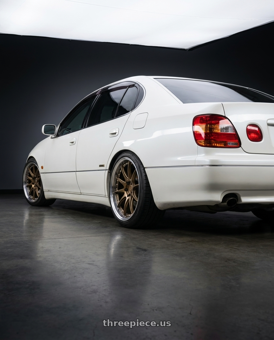 2001 Toyota Aristo V300/GS300 with Aodhan DS07 5x114.3 18x9.5+30 Bronze w/Machined Lip wheels rear three quarter view square tires