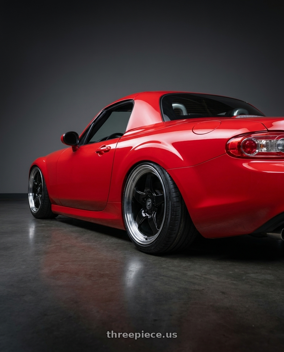 2012 Mazda MX-5 Miata NC with Forgestar D5 Drag 5x114.3 17x5 -21 Gloss Black Machined wheels rear three quarter view slight stretch tires