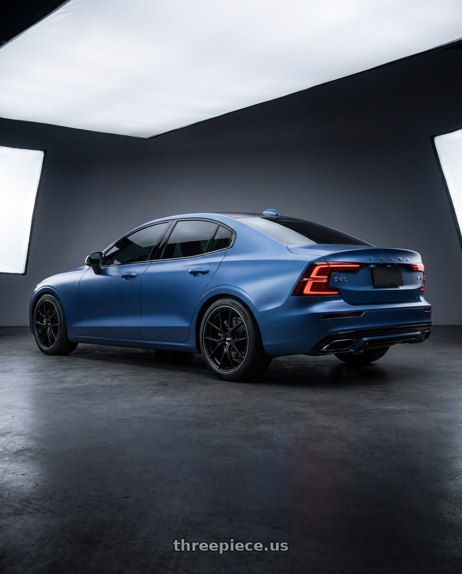 2020 Volvo S60 with BBS RI-A 5x112 18x8.5 +38 Diamond Black wheels rear three quarter view square tires