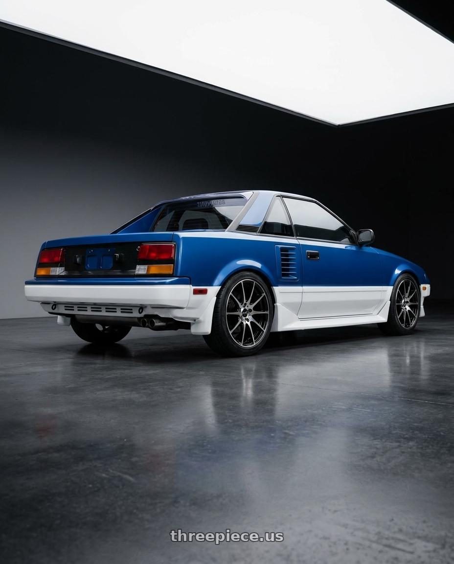 1986 Toyota mr2 with Spec-1 SP-76 4x100/4x114.3 15x6.5 +20 Gloss Black & Machined wheels rear three quarter view square tires