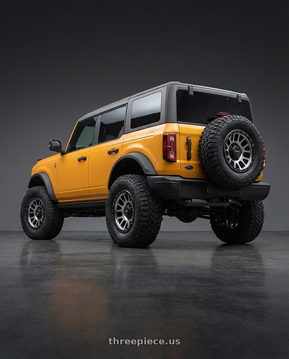 2024 Ford Bronco with Vision Off-Road 111 Nemesis 6x139.7 20x9+10 Matte Black Machined Face wheels rear three quarter view meaty tires