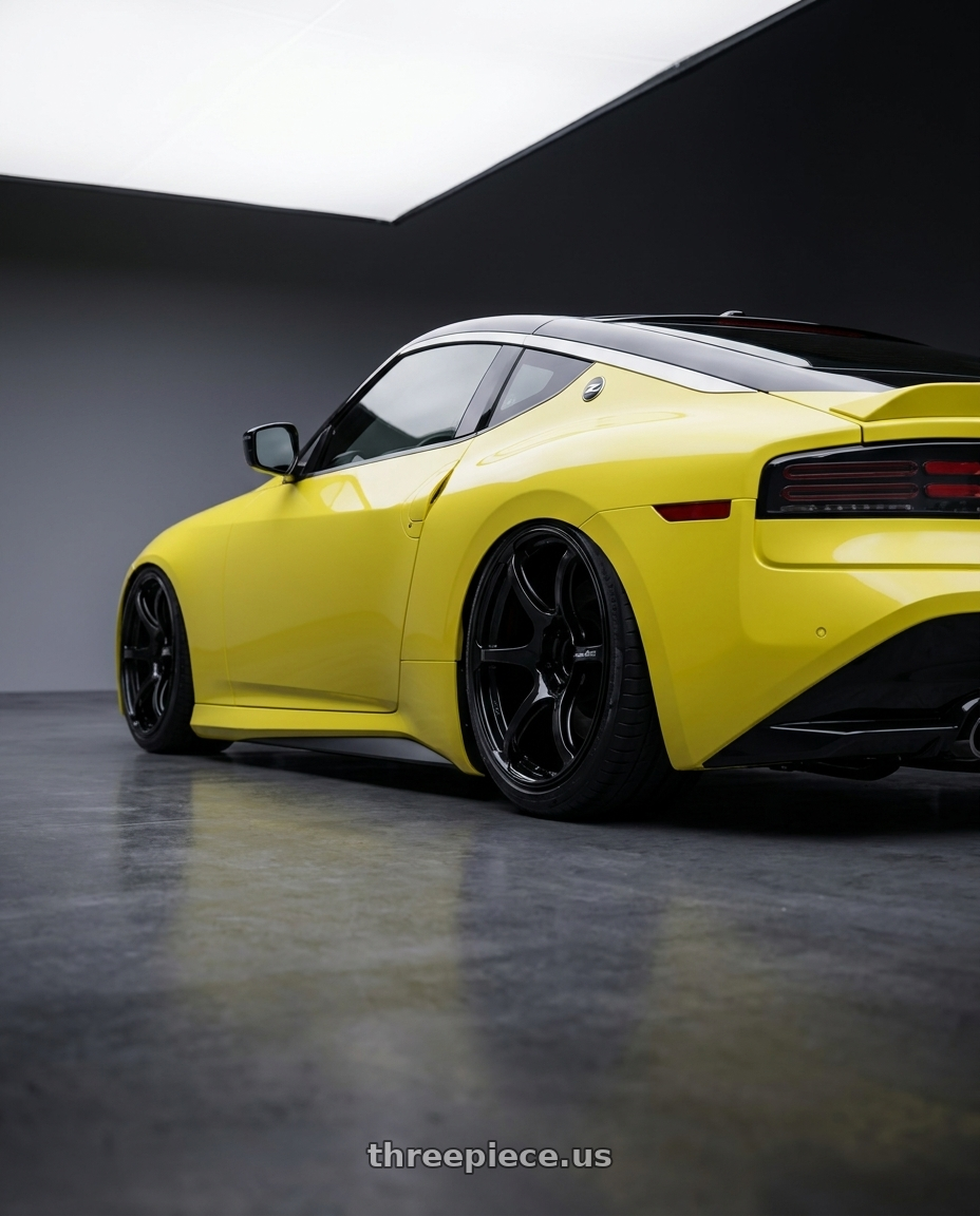 2024 Nissan Z with Advan RGIII 5x114.3 19x9.5+45 Gloss Black wheels rear three quarter view slight stretch tires
