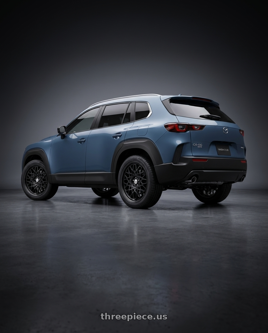 2023 Mazda CX-50 with Work Seeker Cx 5x114.3 17x8+45 A Disk Matte Black wheels rear three quarter view square tires