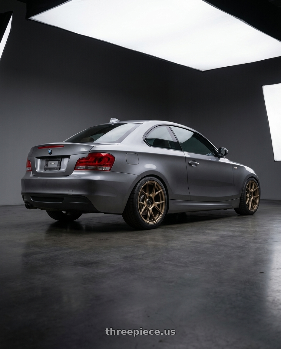 2012 BMW 1 Series E82 with Konig Ampliform 5x120 18x9.5+35 Gloss Bronze wheels rear three quarter view square tires
