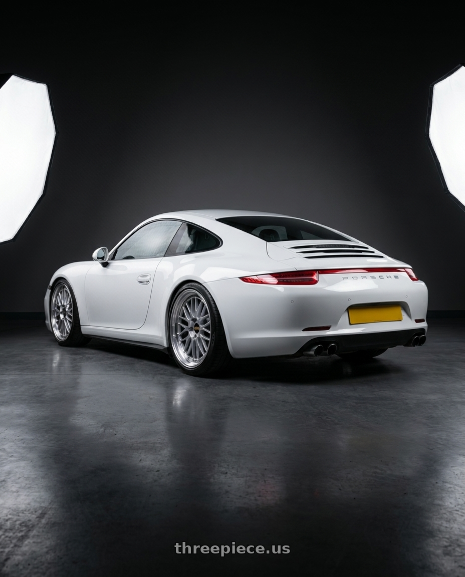 2015 Porsche 911 with BBS LM 5x120 21x10.0+38 Diamond Silver wheels rear three quarter view square tires