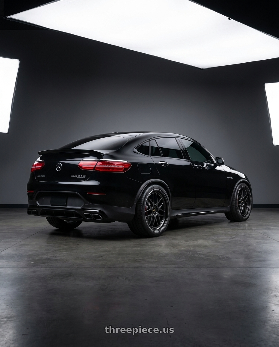 2021 mercedes glc63s with BBS LM 5x112 21x10.0+40 Diamond Black wheels rear three quarter view square tires